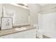 Bathroom featuring a vanity with sink, a mirror, and a tub with shower at 2306 Brightwell Pl, Indianapolis, IN 46260