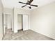 Bedroom features a standard closet and ceiling fan at 2306 Brightwell Pl, Indianapolis, IN 46260