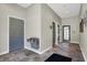 Hallway with neutral walls and flooring; a water fountain at 2306 Brightwell Pl, Indianapolis, IN 46260