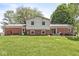 Spacious backyard featuring a well-maintained lawn and an inviting outdoor space, perfect for relaxation and entertainment at 2346 N State Road 39, Danville, IN 46122
