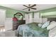 Bedroom featuring a dark wood dresser and a ceiling fan at 2346 N State Road 39, Danville, IN 46122