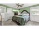 Well-lit bedroom features a comfortable bed and classic details like the white trim at 2346 N State Road 39, Danville, IN 46122