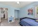 Bright, airy bedroom featuring a closet space with custom name sign above at 2346 N State Road 39, Danville, IN 46122