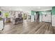 Spacious open-concept kitchen with center island, modern appliances, and hardwood-style floors at 2346 N State Road 39, Danville, IN 46122