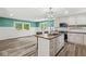 Bright kitchen with a butcher block center island, seating, and plenty of natural light at 2346 N State Road 39, Danville, IN 46122