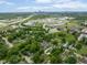 Aerial view of home featuring a cityscape in the distance and surrounding greenery at 2417 N Rural N Ave, Indianapolis, IN 46218