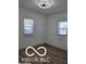 Bedroom with clean white walls, natural light, and new hardwood floors at 2421 N Arsenal Ave, Indianapolis, IN 46218