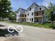 New construction featuring multi-story residences with individual balconies and modern architectural design at 2421 N Arsenal Ave, Indianapolis, IN 46218