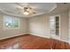 Spacious bedroom featuring a ceiling fan, hardwood floors, and an attached bathroom at 2422 Oak Dr, Clayton, IN 46118