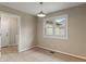 Empty dining room with window and access to laundry room at 2422 Oak Dr, Clayton, IN 46118