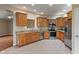 Spacious kitchen with stainless steel appliances and granite countertops at 2422 Oak Dr, Clayton, IN 46118