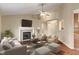 Bright living room with a fireplace, vaulted ceilings, and hardwood floors at 2422 Oak Dr, Clayton, IN 46118