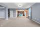Basement living space with modern finishes connects seamlessly to the kitchen at 2502 Creekland Dr, Columbus, IN 47201