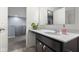 Bathroom features an expansive countertop and large mirror for convenience at 2502 Creekland Dr, Columbus, IN 47201