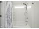 Bathroom features a shower-tub combination with white tile surround at 2502 Creekland Dr, Columbus, IN 47201