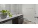 Bathroom featuring a modern vanity with a stylish sink and fixtures at 2502 Creekland Dr, Columbus, IN 47201