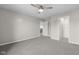 Bright bedroom boasts neutral walls and carpet, plus a modern ceiling fan at 2502 Creekland Dr, Columbus, IN 47201