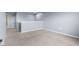 Bright and spacious bonus room with soft carpet and neutral paint at 2502 Creekland Dr, Columbus, IN 47201
