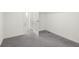Walk-in closet features neutral carpeting at 2502 Creekland Dr, Columbus, IN 47201
