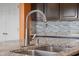 Close up view of modern stainless steel sink with granite countertops at 2502 Creekland Dr, Columbus, IN 47201