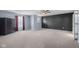 Spacious main bedroom features neutral carpeting, ceiling fan and a large closet/wardrobe at 2502 Creekland Dr, Columbus, IN 47201