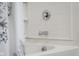 Close up of the shower-tub faucet and shower head at 2502 Creekland Dr, Columbus, IN 47201