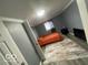 Comfortable bedroom with a bed and wood flooring, offering a cozy retreat at 3041 S Rybolt Ave, Indianapolis, IN 46241