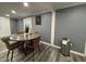 Cozy dining area with a round table, four chairs, and decor accents at 3041 S Rybolt Ave, Indianapolis, IN 46241