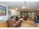Finished basement with living area, home gym, and stylish, durable laminate floors at 3105 E Banta Rd, Indianapolis, IN 46227