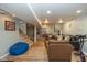 Finished basement with living area, home gym, and staircase access to upper floor at 3105 E Banta Rd, Indianapolis, IN 46227