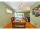 Cozy dining area with hardwood floors and traditional-style wooden dining set at 3105 E Banta Rd, Indianapolis, IN 46227