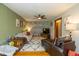 Bright living room with a patterned rug, accent wall, and comfortable seating at 3105 E Banta Rd, Indianapolis, IN 46227