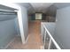 Upper hallway area with gray walls and carpeting, natural light and views to rooms at 3602 N Colorado Ave, Indianapolis, IN 46218