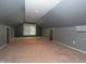 Finished attic room offers versatility, natural light, and potential as a bedroom or playroom at 3602 N Colorado Ave, Indianapolis, IN 46218