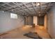 Spacious unfinished basement with exposed ceiling, block walls, and potential for customization at 3602 N Colorado Ave, Indianapolis, IN 46218