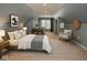 Serene bedroom featuring a neutral color palette, plush bedding, and natural light at 3602 N Colorado Ave, Indianapolis, IN 46218