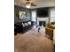 Living room featuring a fireplace, neutral walls, and plush carpeting at 3602 N Colorado Ave, Indianapolis, IN 46218