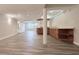 View of the basement featuring recessed lighting, bar with sink, and wood grain flooring at 404 Joseph Way, Carmel, IN 46032
