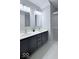 Bathroom with a dual sink vanity, large mirrors and updated lighting at 404 Joseph Way, Carmel, IN 46032