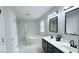 Bathroom featuring a double vanity, standalone shower, and garden tub at 404 Joseph Way, Carmel, IN 46032
