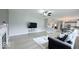 Open-concept living space with living room, dining area, and kitchen at 404 Joseph Way, Carmel, IN 46032