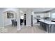 Open floorplan showcasing the dining area and kitchen, ideal for entertaining at 404 Joseph Way, Carmel, IN 46032