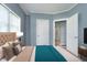 Comfortable bedroom with a plush bed, soft lighting, and neutral decor creating a relaxing ambiance at 4325 Norwaldo Ave, Indianapolis, IN 46205