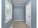 Bedroom showcasing a window, wood flooring and a closet door on the right at 4325 Norwaldo Ave, Indianapolis, IN 46205