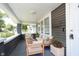Inviting front porch with comfortable seating, perfect for relaxing outdoors at 4325 Norwaldo Ave, Indianapolis, IN 46205