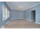 Living room with natural light, fresh paint and wood flooring provides open space at 4325 Norwaldo Ave, Indianapolis, IN 46205