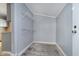 Walk-in pantry with shelving offers ample storage space and wood-look floors at 4325 Norwaldo Ave, Indianapolis, IN 46205