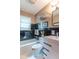 Classic bathroom featuring black tile, white vanity and updated fixtures at 445 N 13Th Ave, Beech Grove, IN 46107