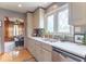 Modern kitchen featuring stainless steel appliances, granite countertops, and ample cabinet space at 445 N 13Th Ave, Beech Grove, IN 46107