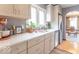 Modern kitchen with stainless steel appliances, stone countertops, and ample counter space at 445 N 13Th Ave, Beech Grove, IN 46107